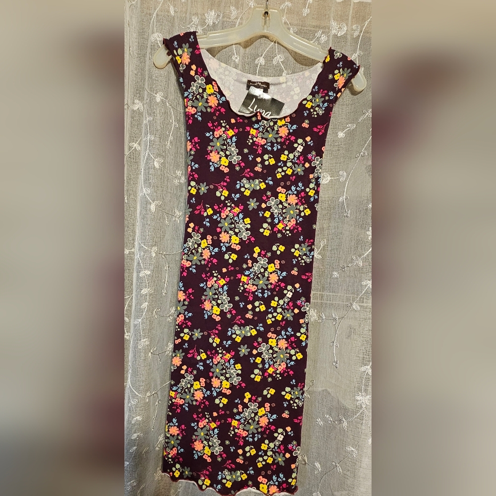 Luna Sleeveless dress with lettuce edge and tie on back